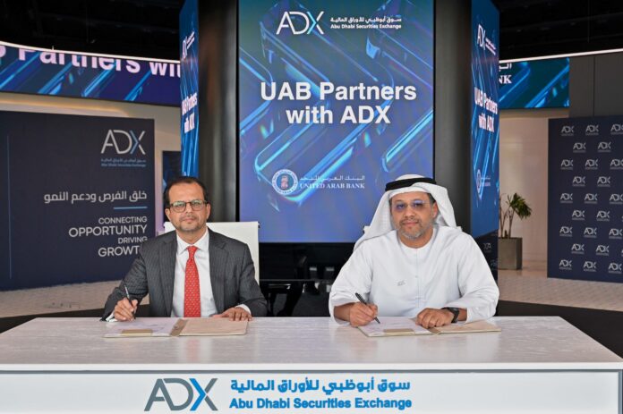 Shirish Bhide Chief Executive Office at UAB and Abdulla Salem Alnuaimi Chief Executive Office at ADX during the signing ceremony
